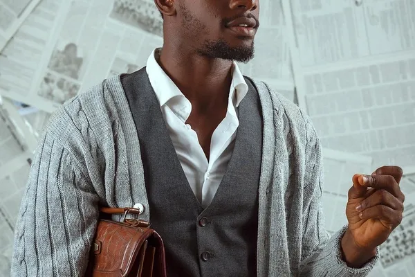 black-businessman-using-digital-tablet-meeting